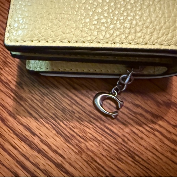 NWT Coach x Peanuts Snap Wallet featuring Charlie Brown - Picture 7 of 9